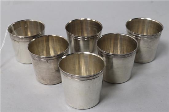 A set of six late 18th/early 19th century French 950 standard silver tots, 145 grams.